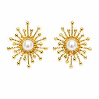 Golden Starburst Pearl Earrings — gold starburst stud with faux pearl center, close-up