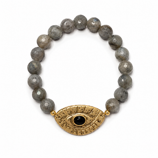 Labradorite beaded bracelet with hammered gold-tone evil eye charm, close-up