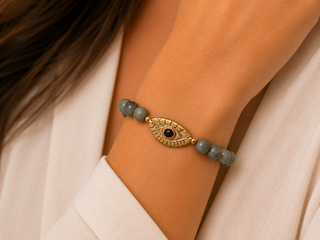 Labradorite beaded bracelet with hammered gold-tone evil eye charm