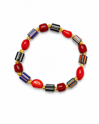 Red, navy and charcoal striped bead stretch bracelet with gold-tone spacers, close-up